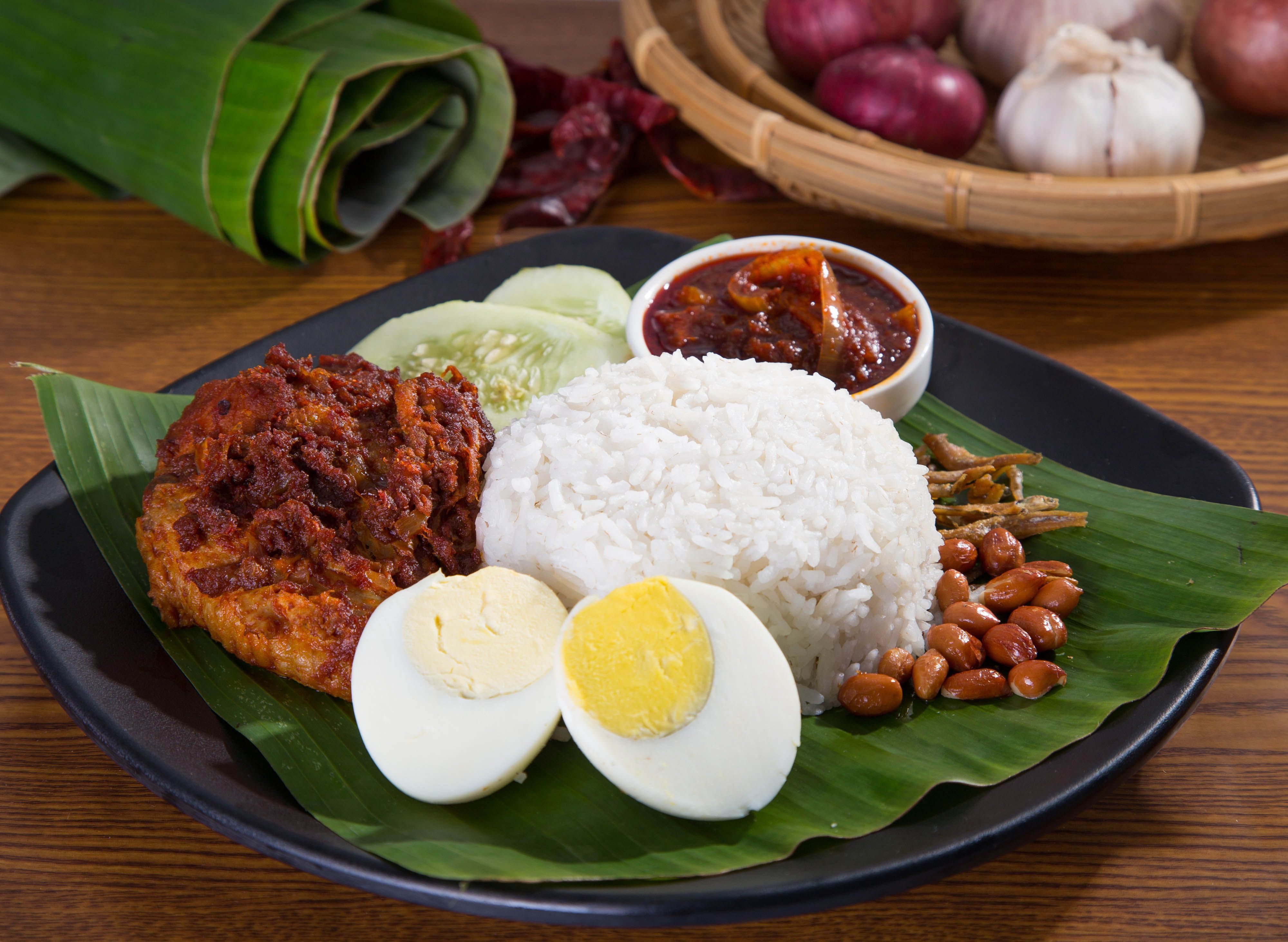 NASI LEMAK KUKUS DAUN PISANG HOMEMADE SAMBAL IKAN BILIS BONDA Menu And