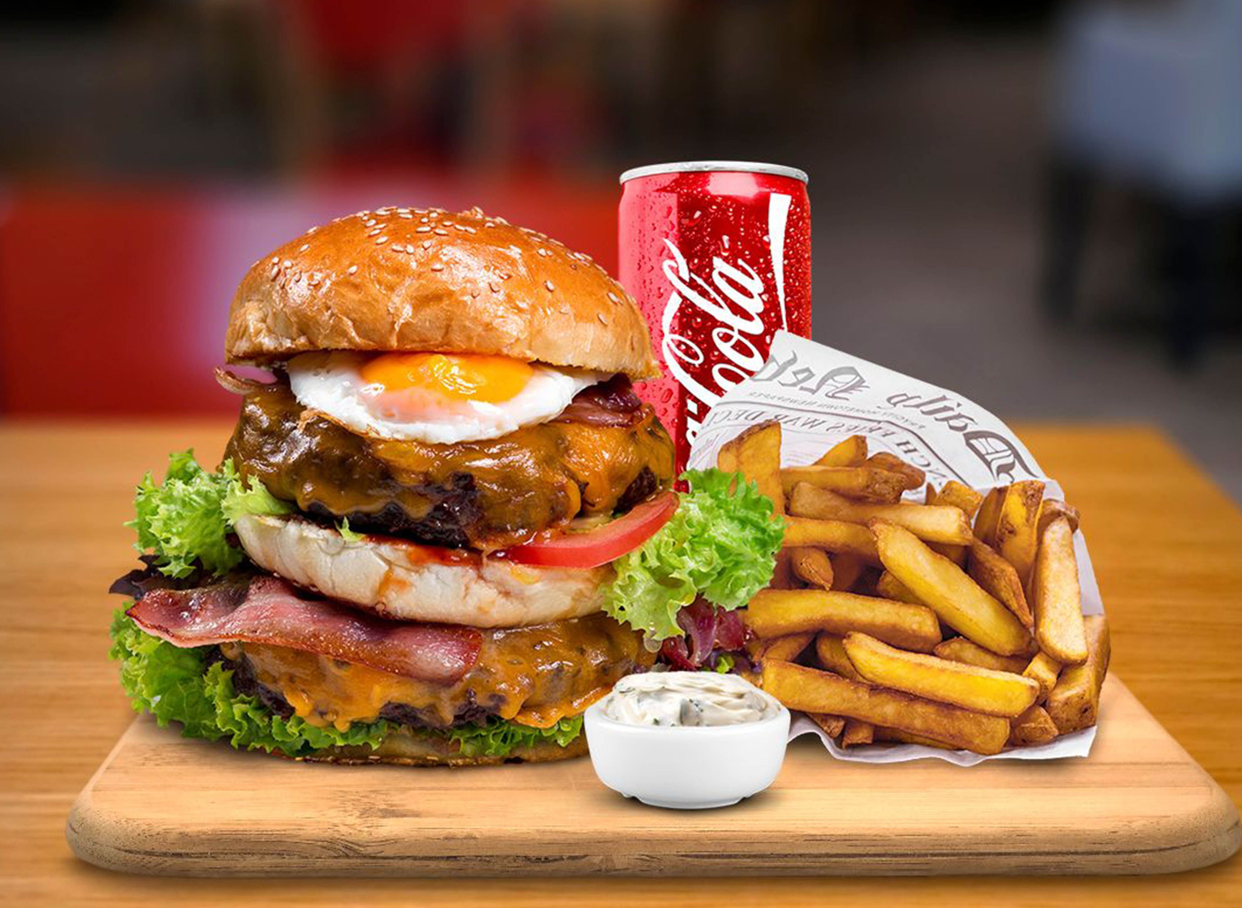 Tom's Burger - OC Nový Smíchov vendor logo