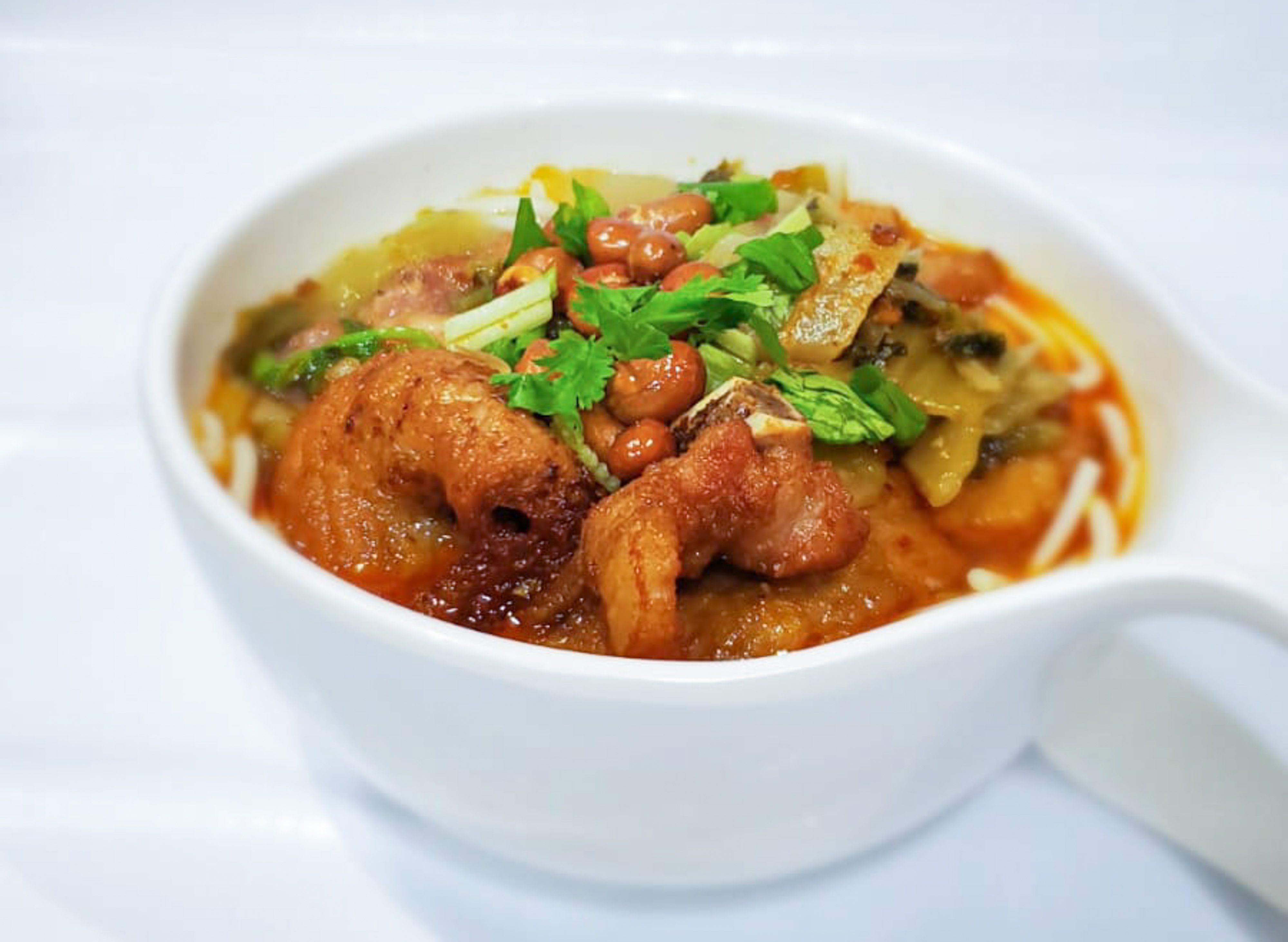 臻味冰室豬扒酸辣米線 (九龍灣) Jun Style Cafe Pork Chop Sichuan Rice Noodle vendor logo