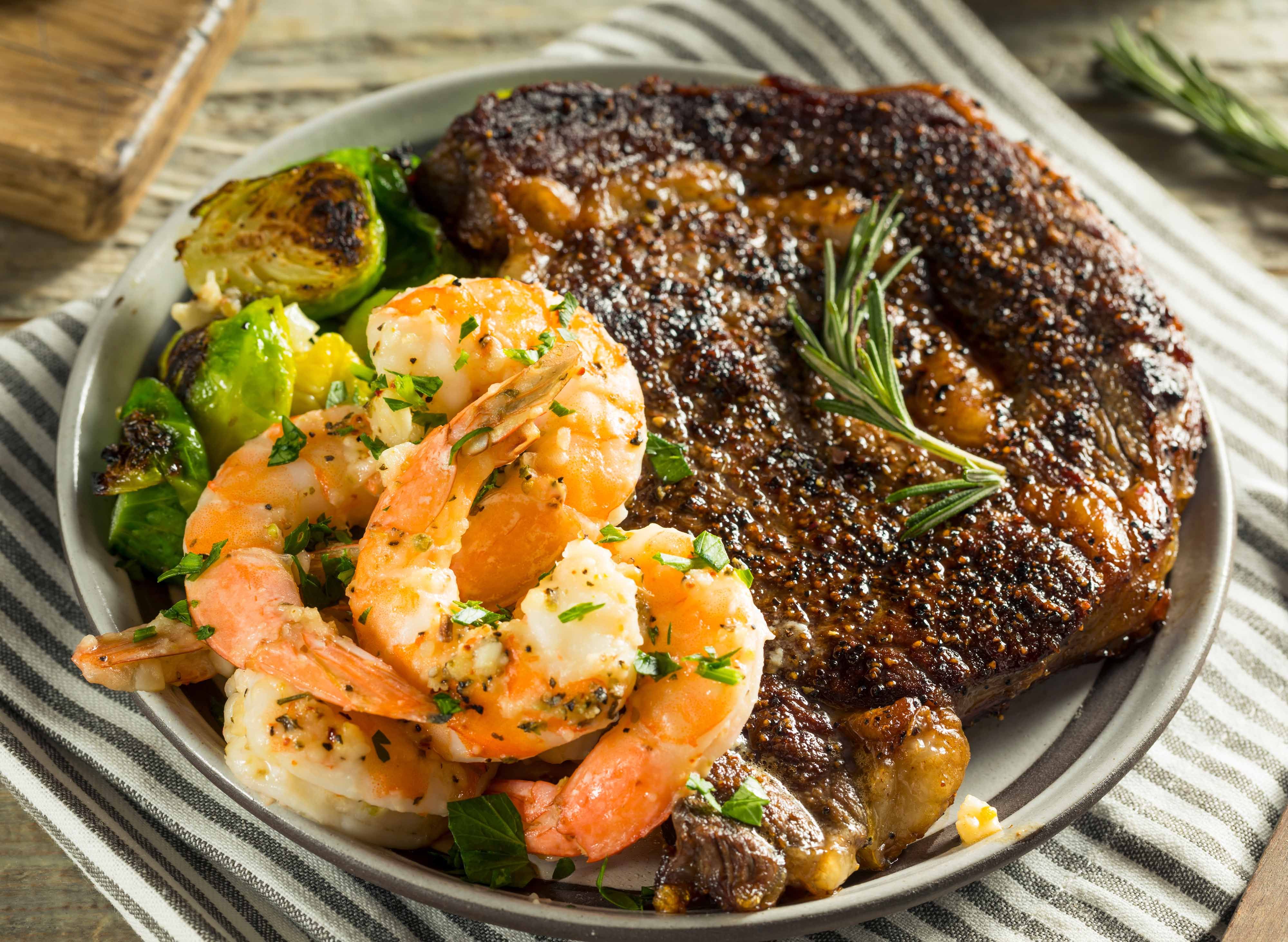Surf & Turf Grill and Bar vendor logo