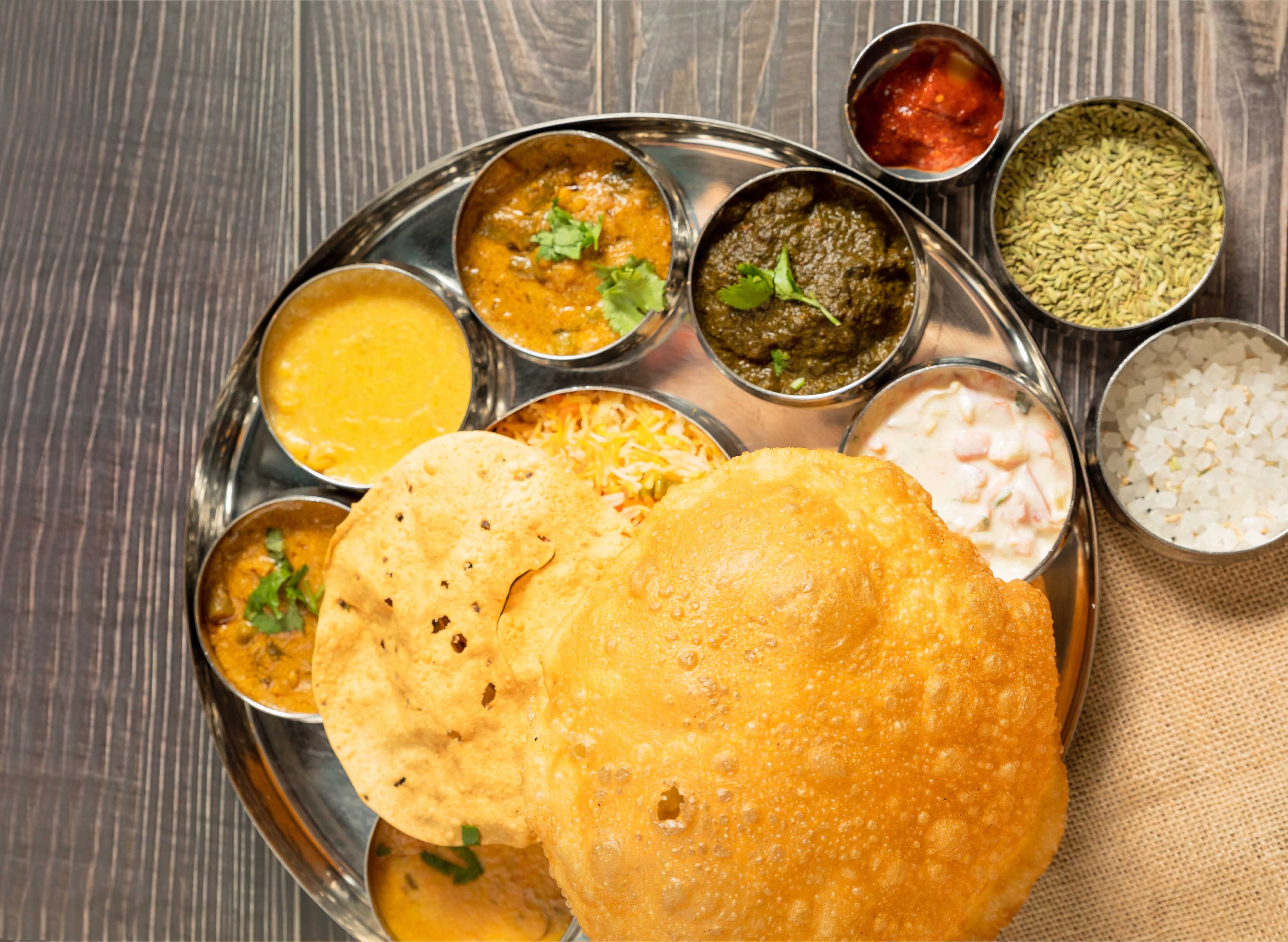 Woodlands Indian Vegetarian Restaurant vendor logo