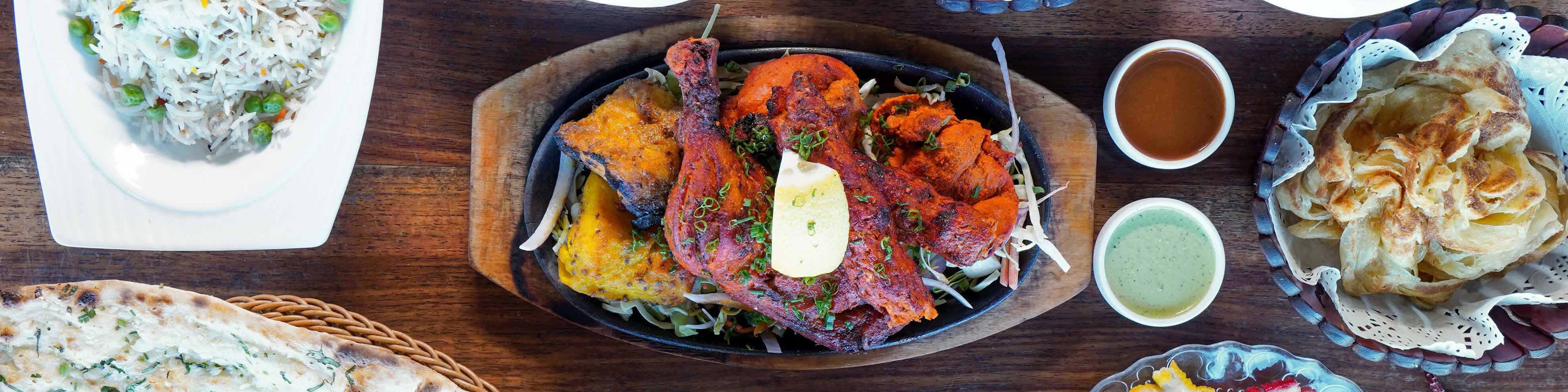 Village Malaysian and Indian Restaurant vendor logo