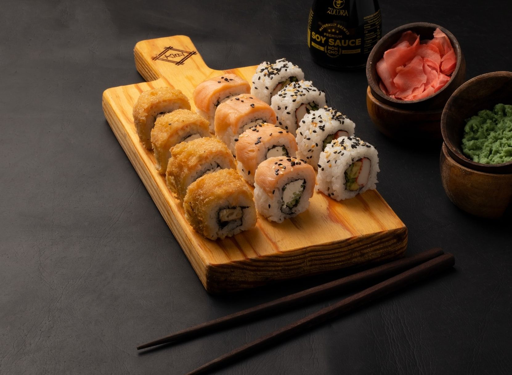 Gui Lin - Tokyo Running-Sushi vendor logo