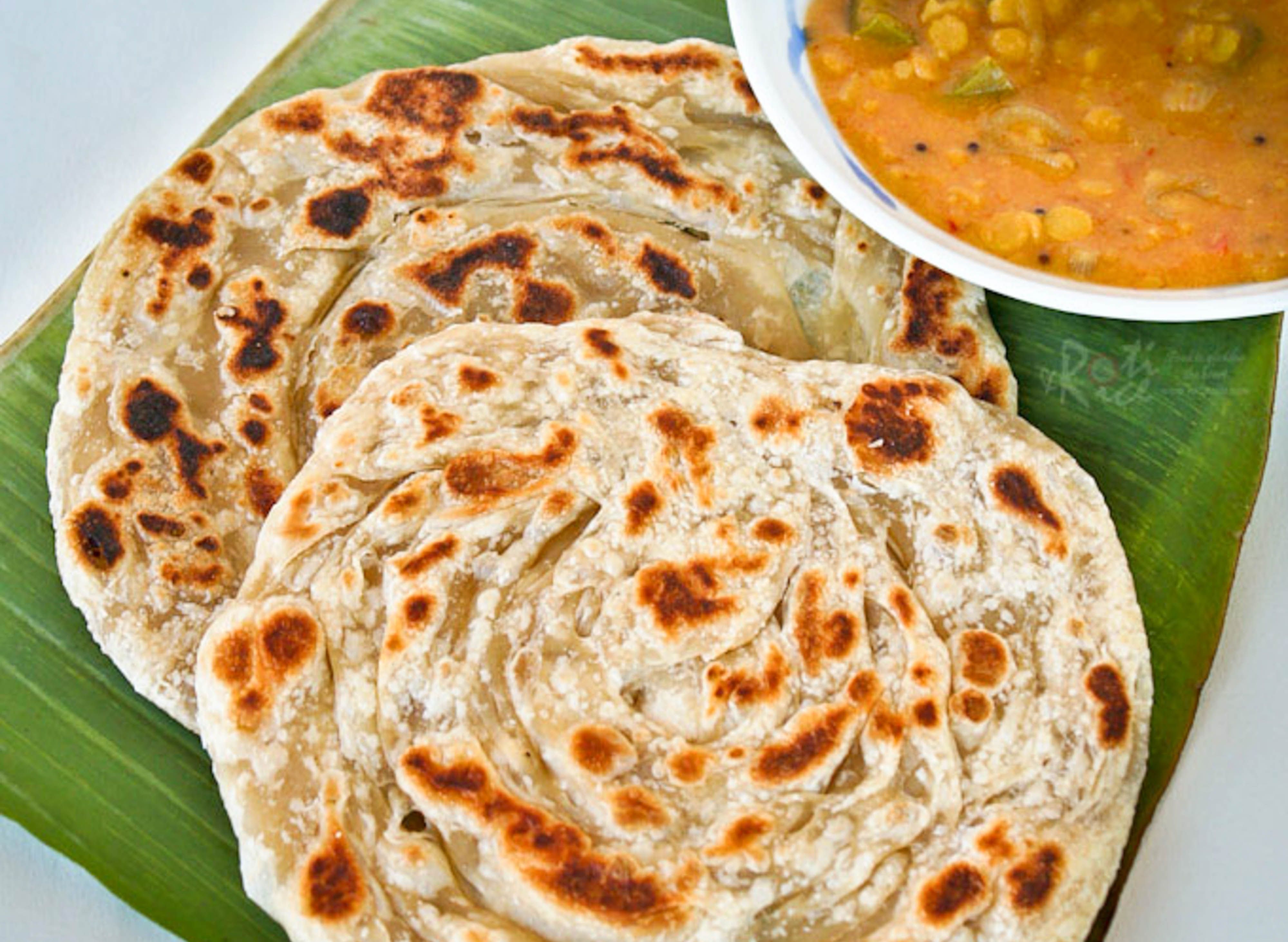 Ротти лепешка. Индийские лепешки чапати. Roti Paratha. Roti Canai (лепешки). Парата индийские.