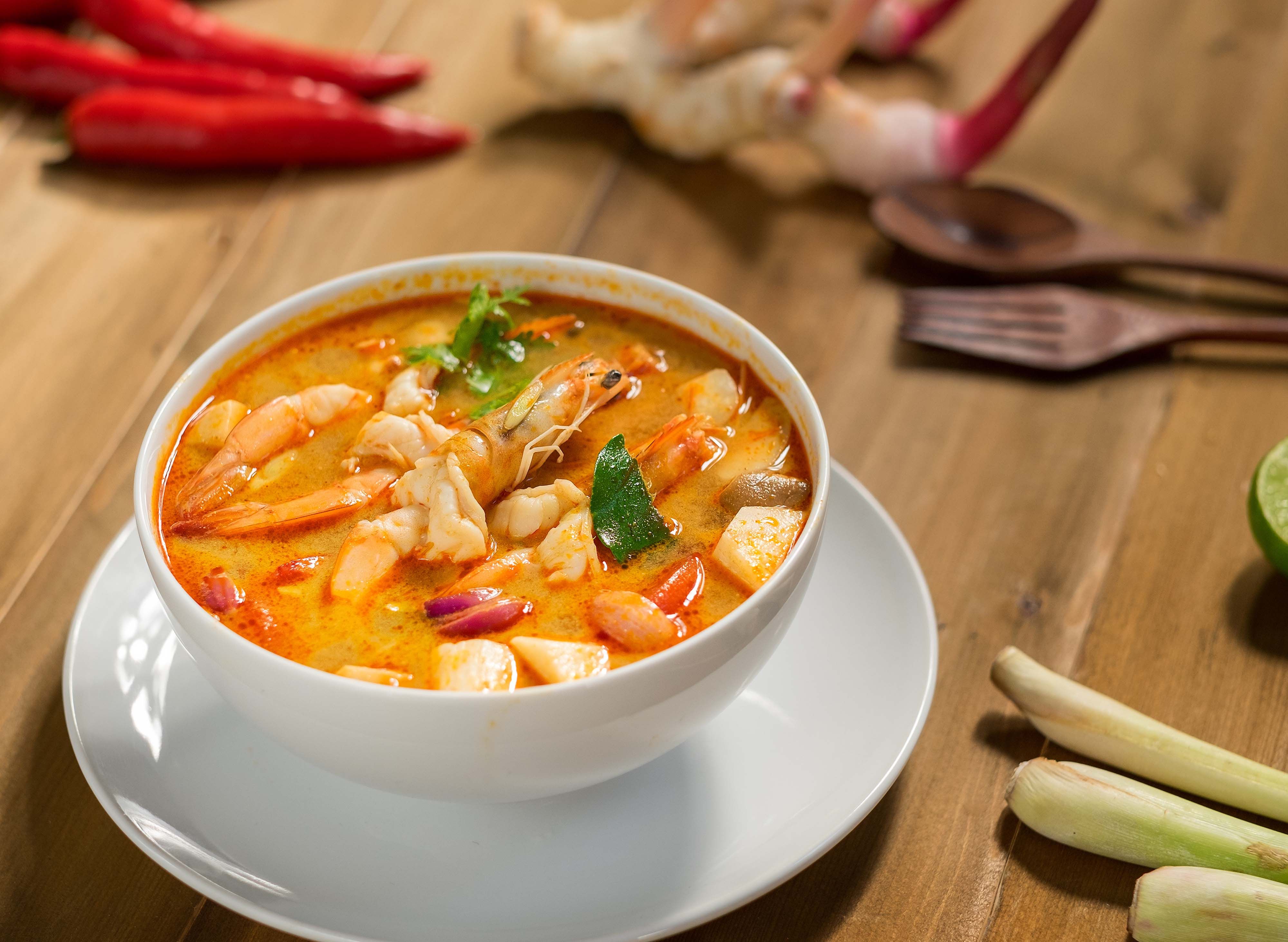 Along Tomyam Bukit Gedung vendor logo
