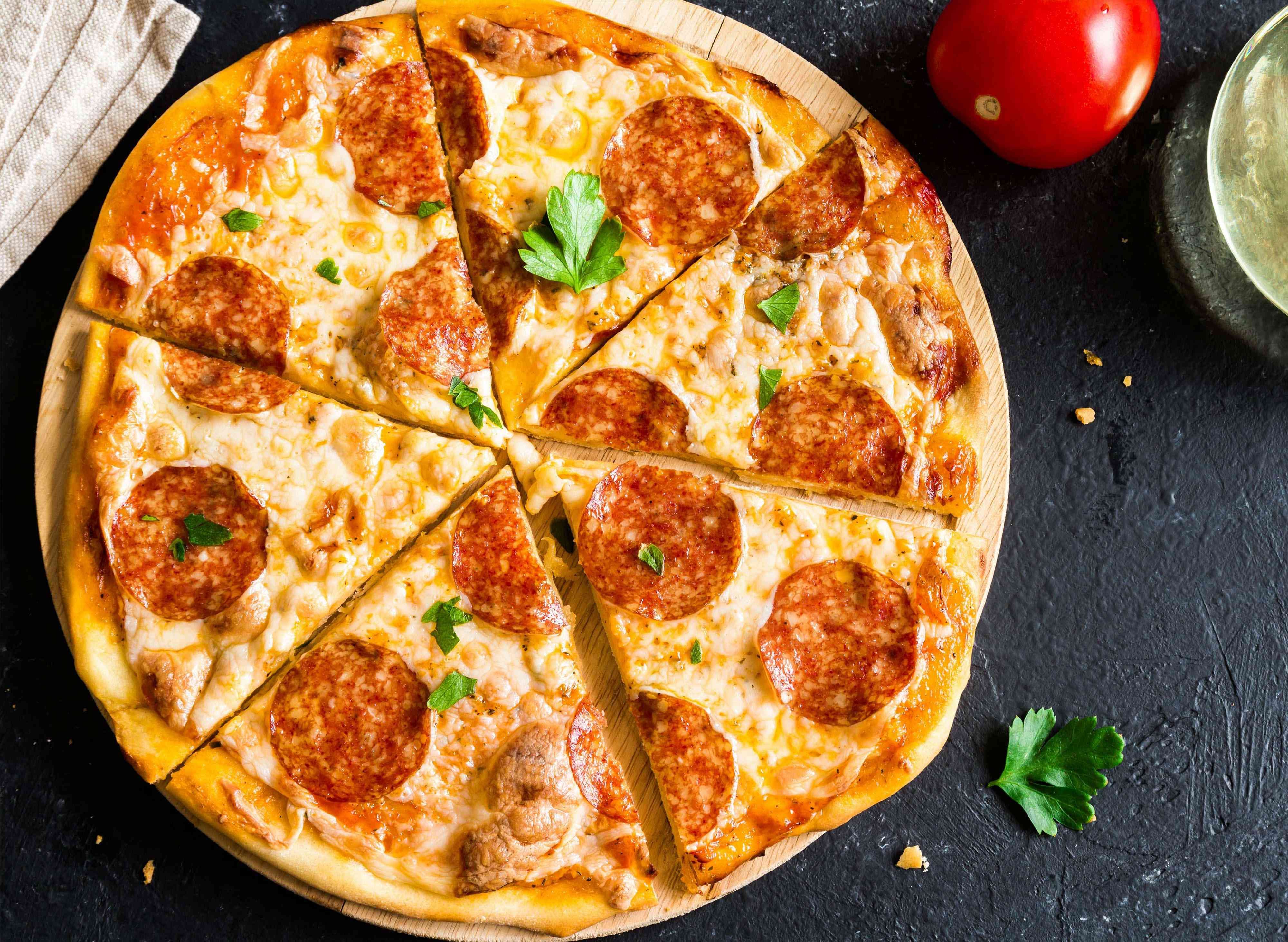 Pizzahuset vendor logo