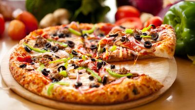 Santino's Supreme Slice Pizza - Nesabel Building