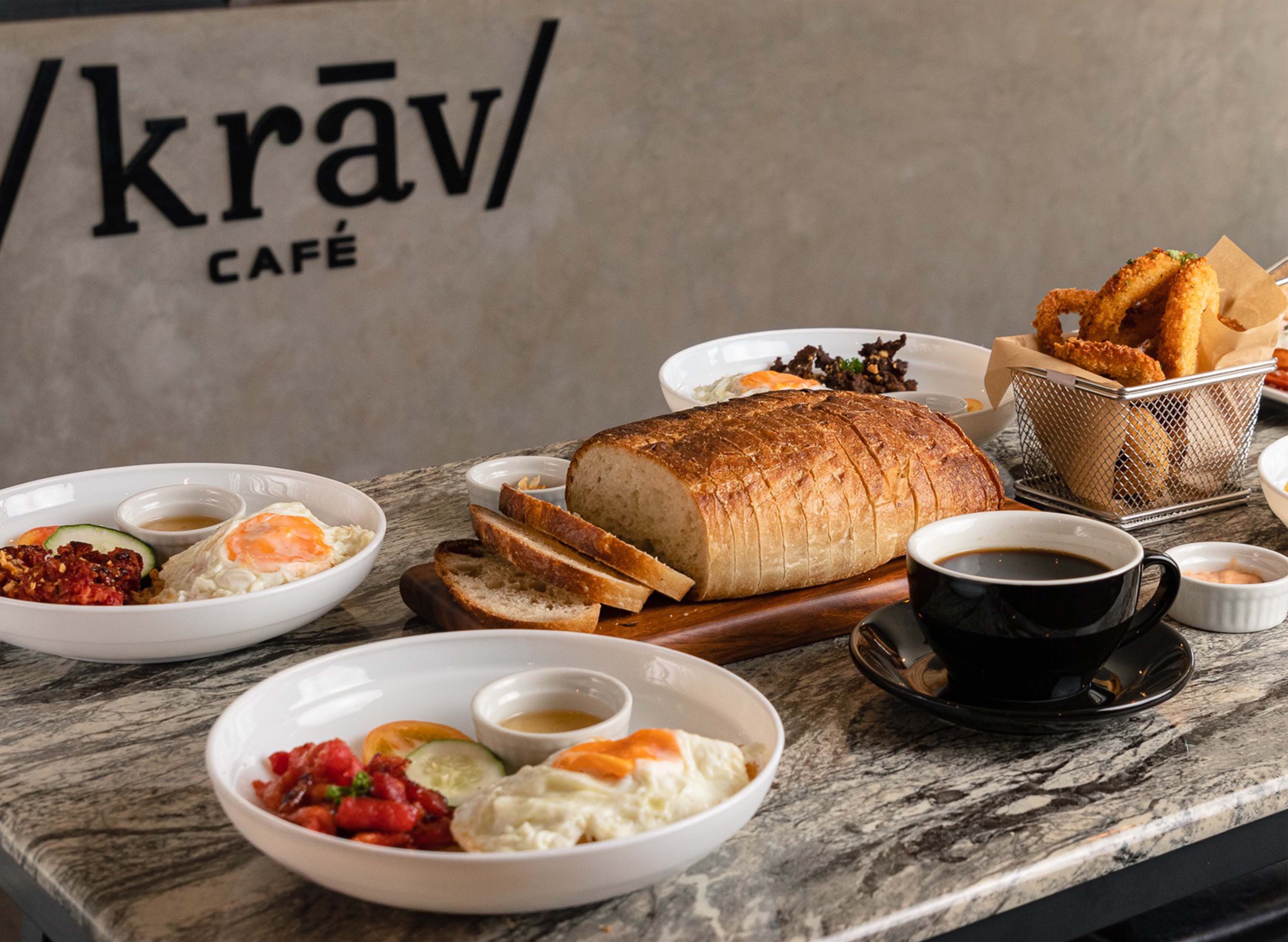 Krāv Cafe - Rosario vendor logo