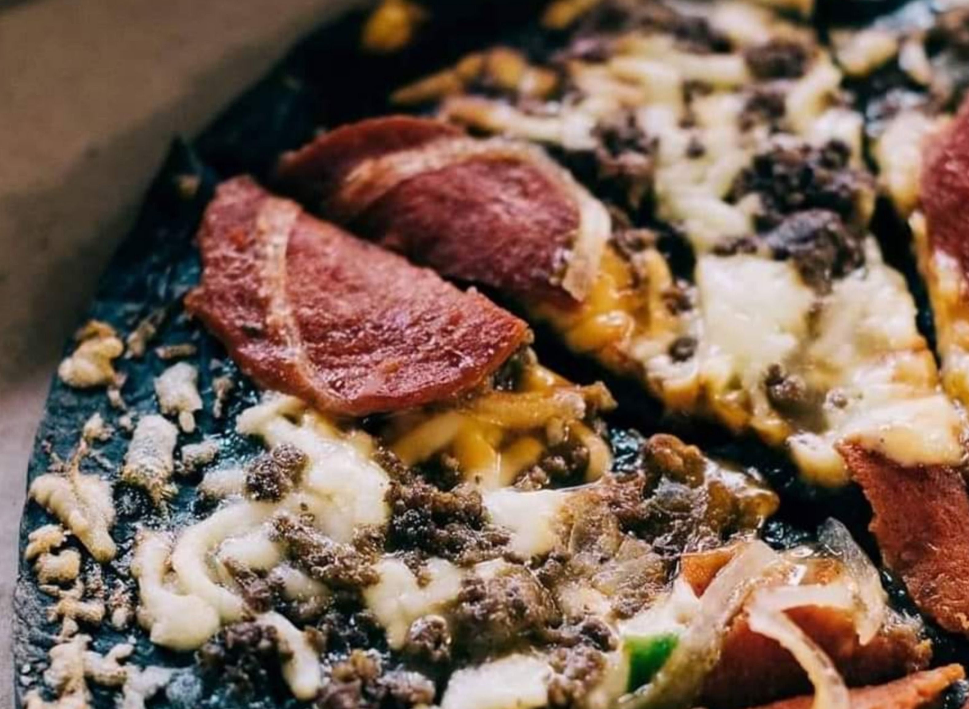 Black Crust Pizza Co. Bay Garden Homes delivery in Los Baños Laguna