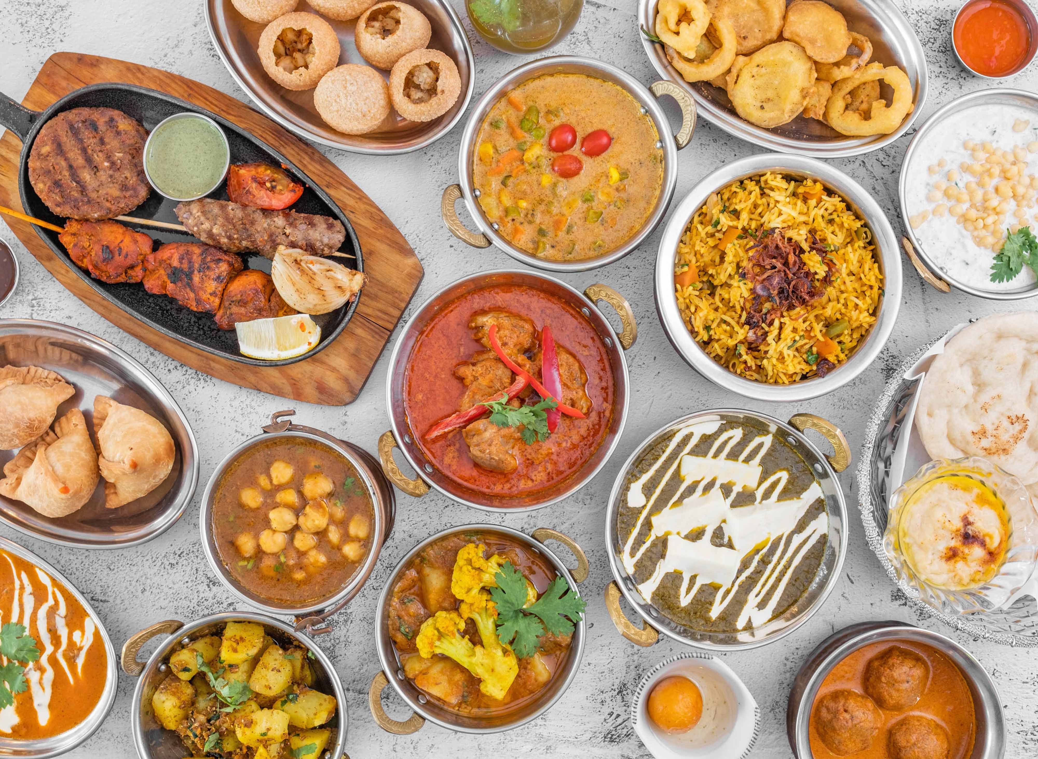 Om Indian Kitchen - The Grove vendor logo