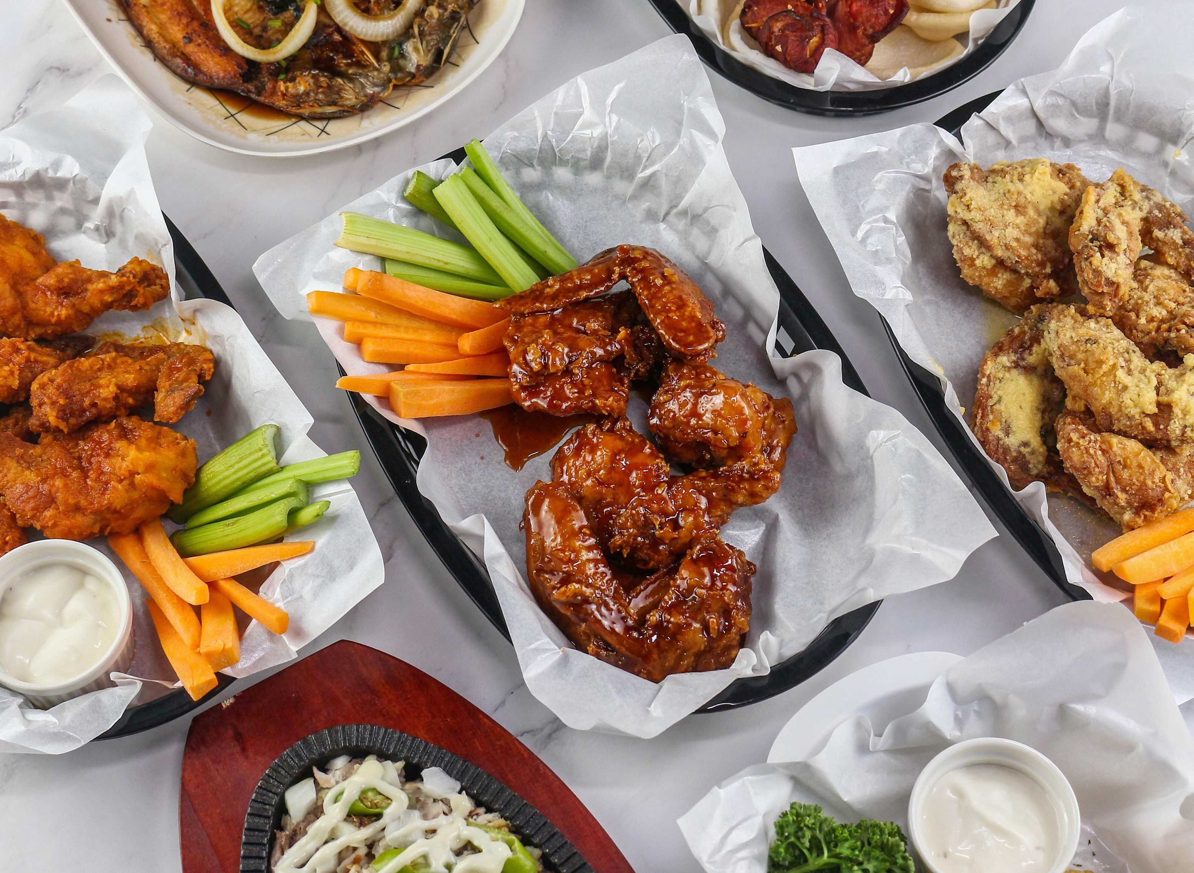Yuan's Wings - P. Lopez vendor logo