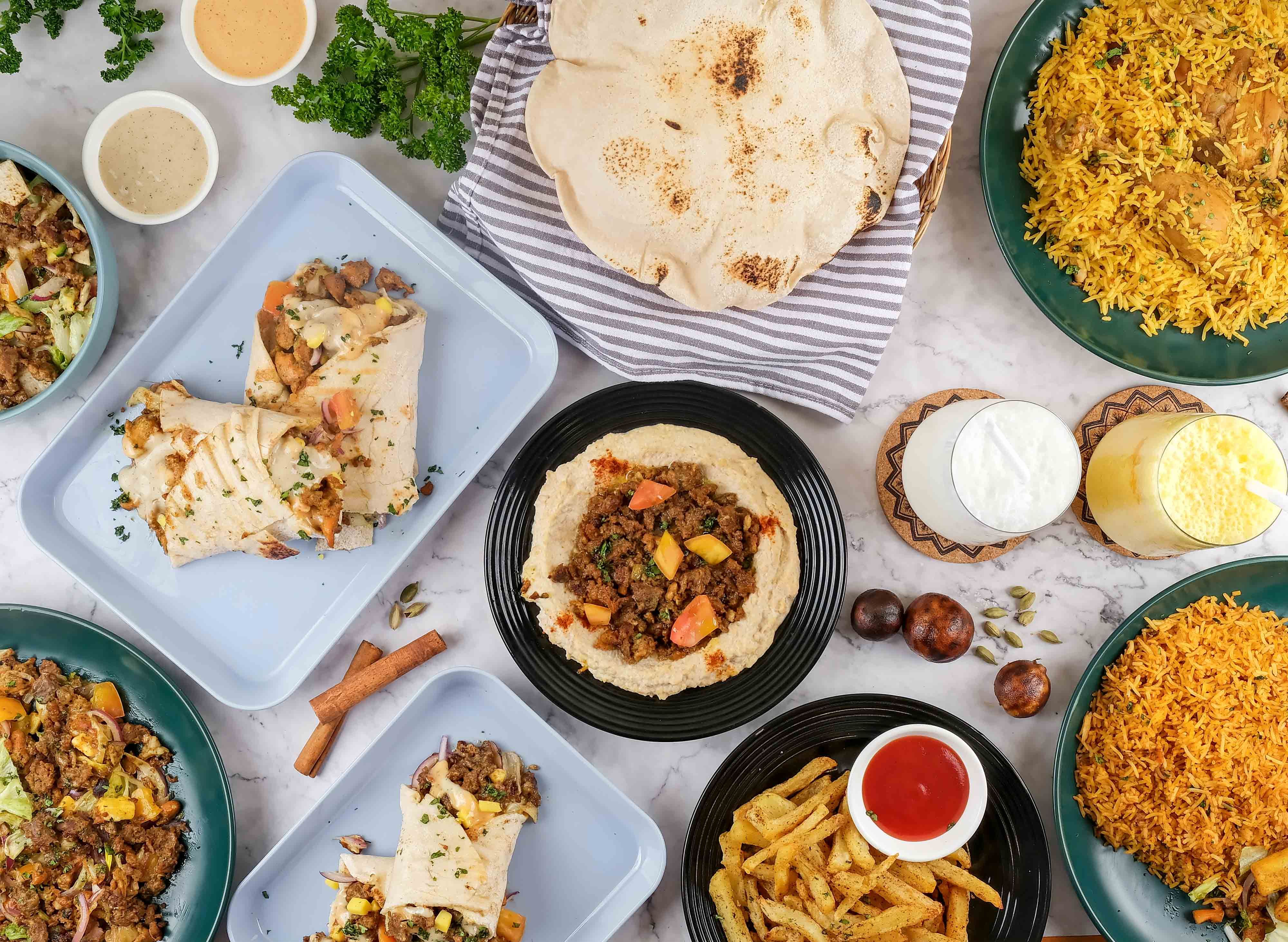 Hossam Shawarma House - Canda Street vendor logo