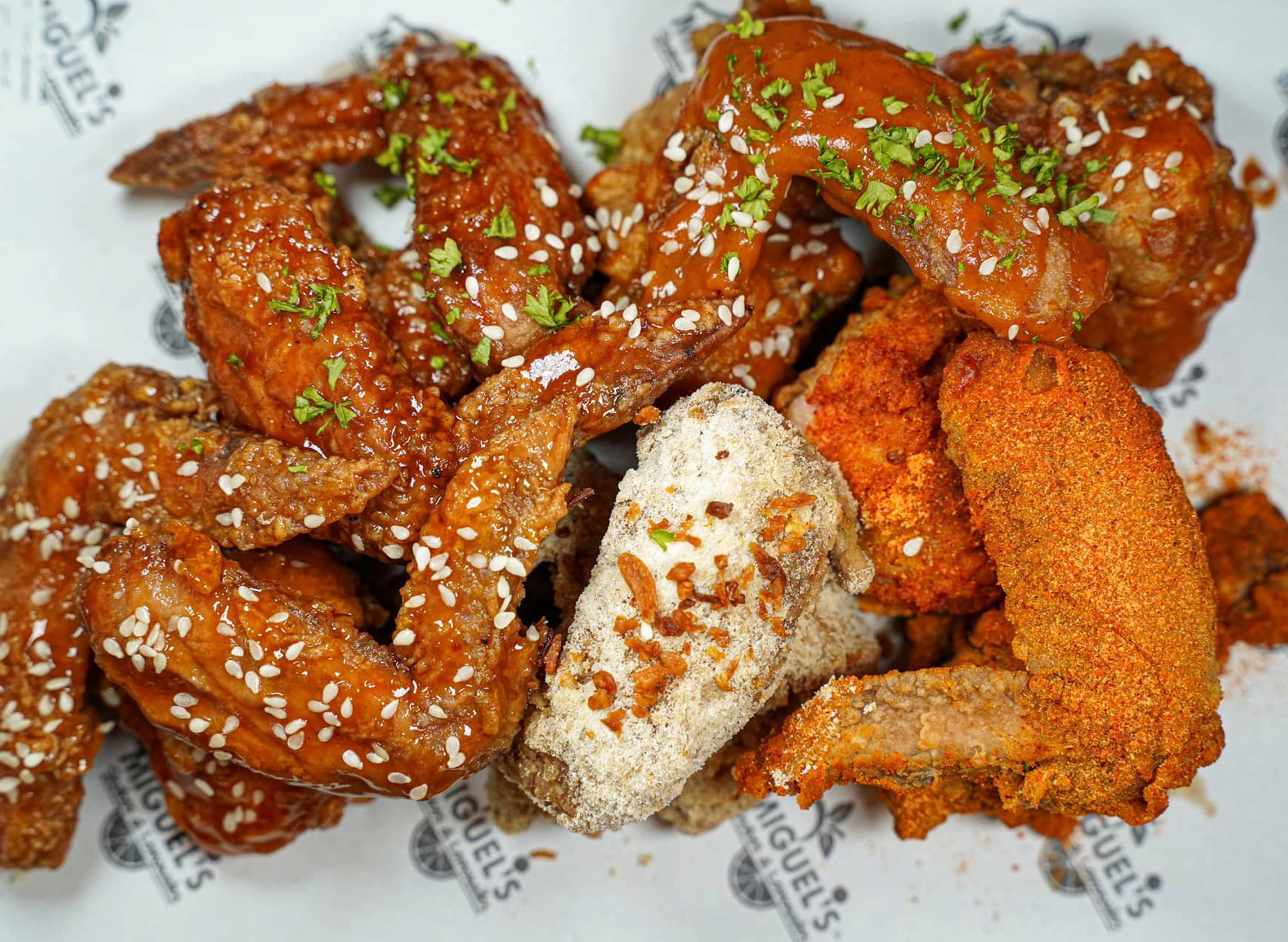 WINGS AND BURGERS by MIGUEL'S Charles & Eron Night Market delivery in