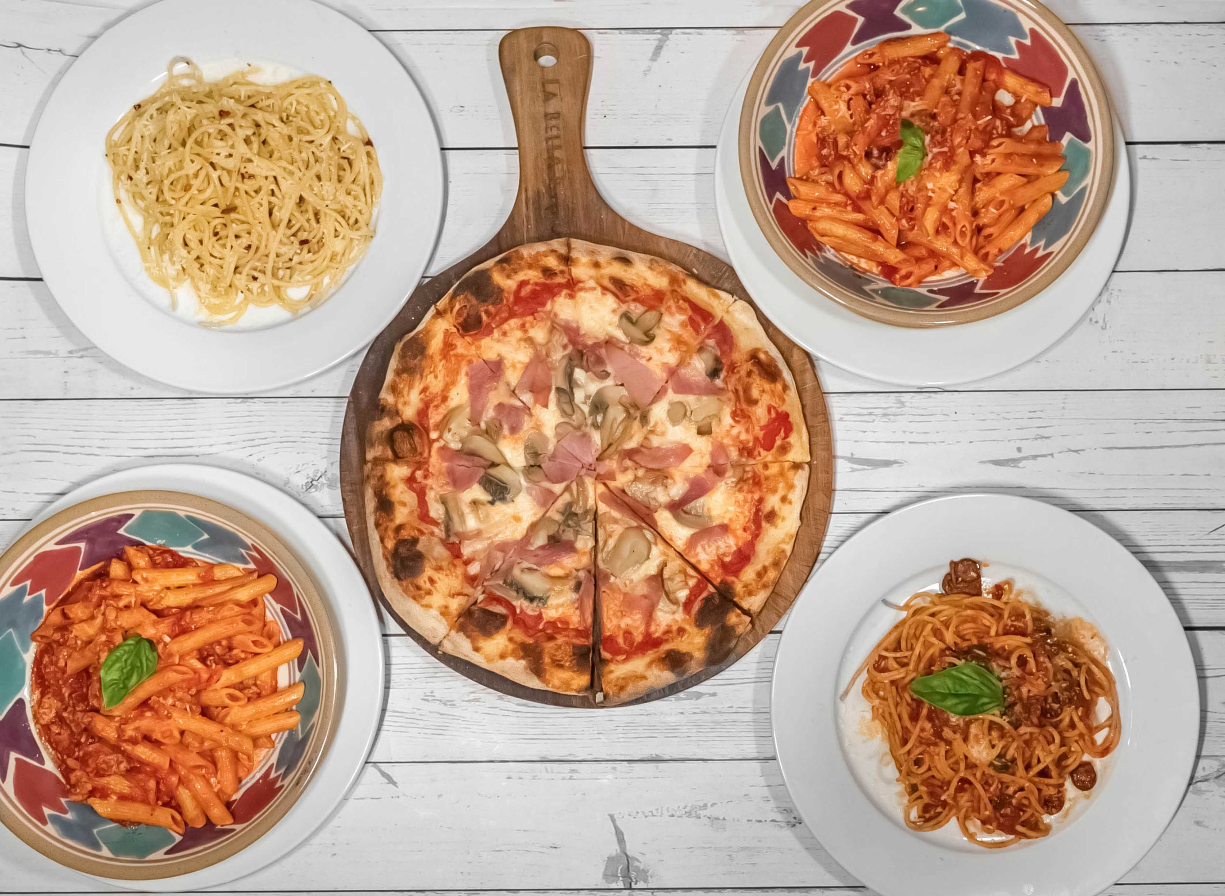 La Bella Pizza Bistro - Holy Family Village vendor logo