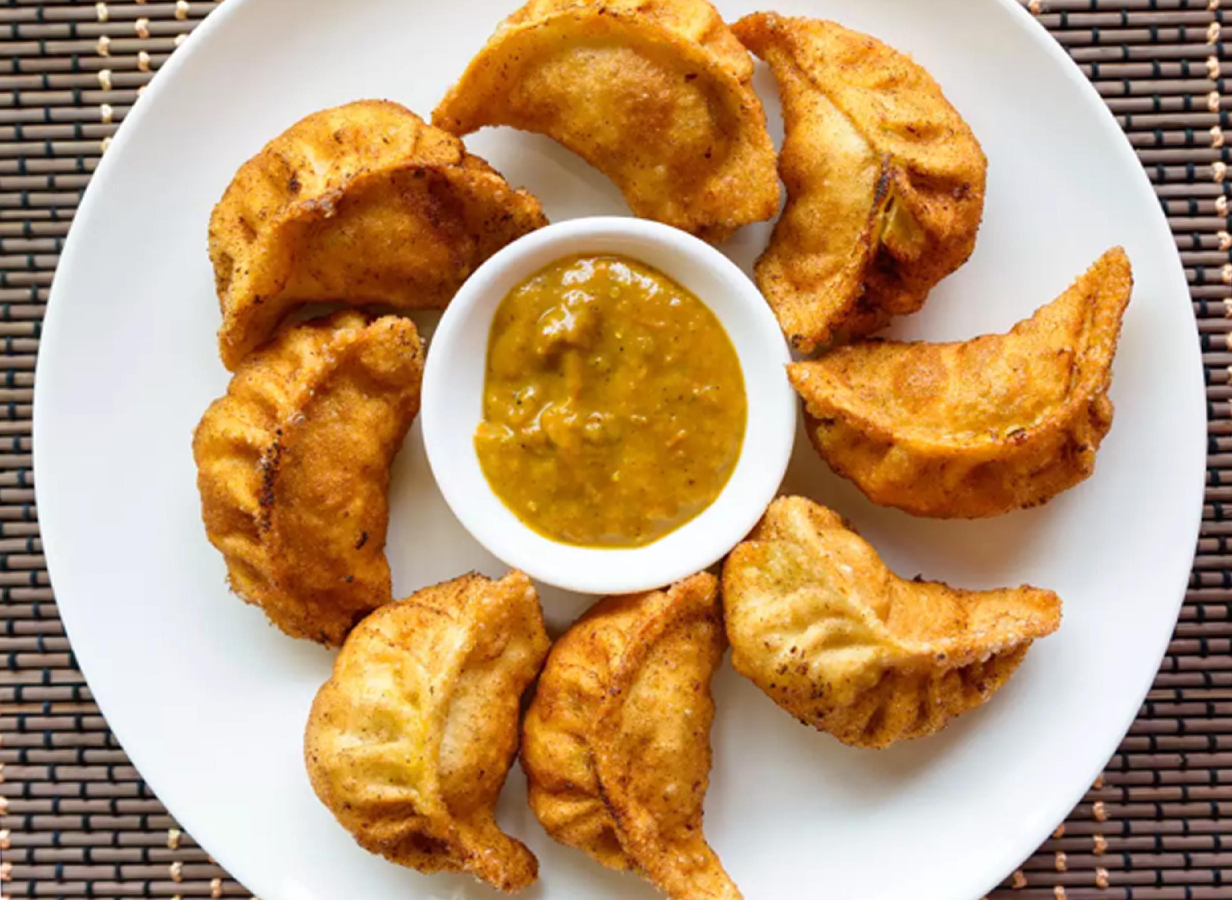 Momos Hub vendor logo