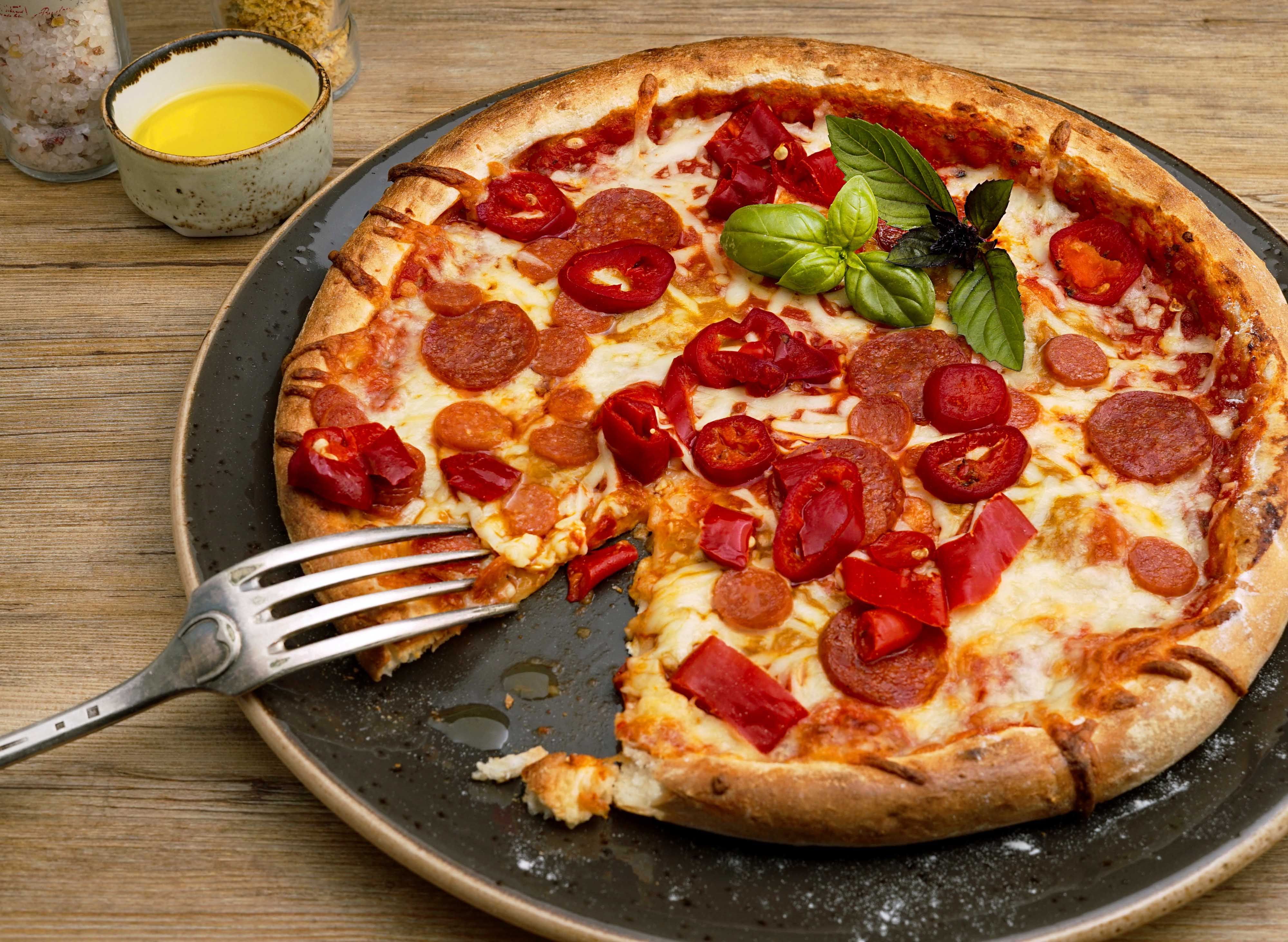 International Pizza - Qasim Market vendor logo