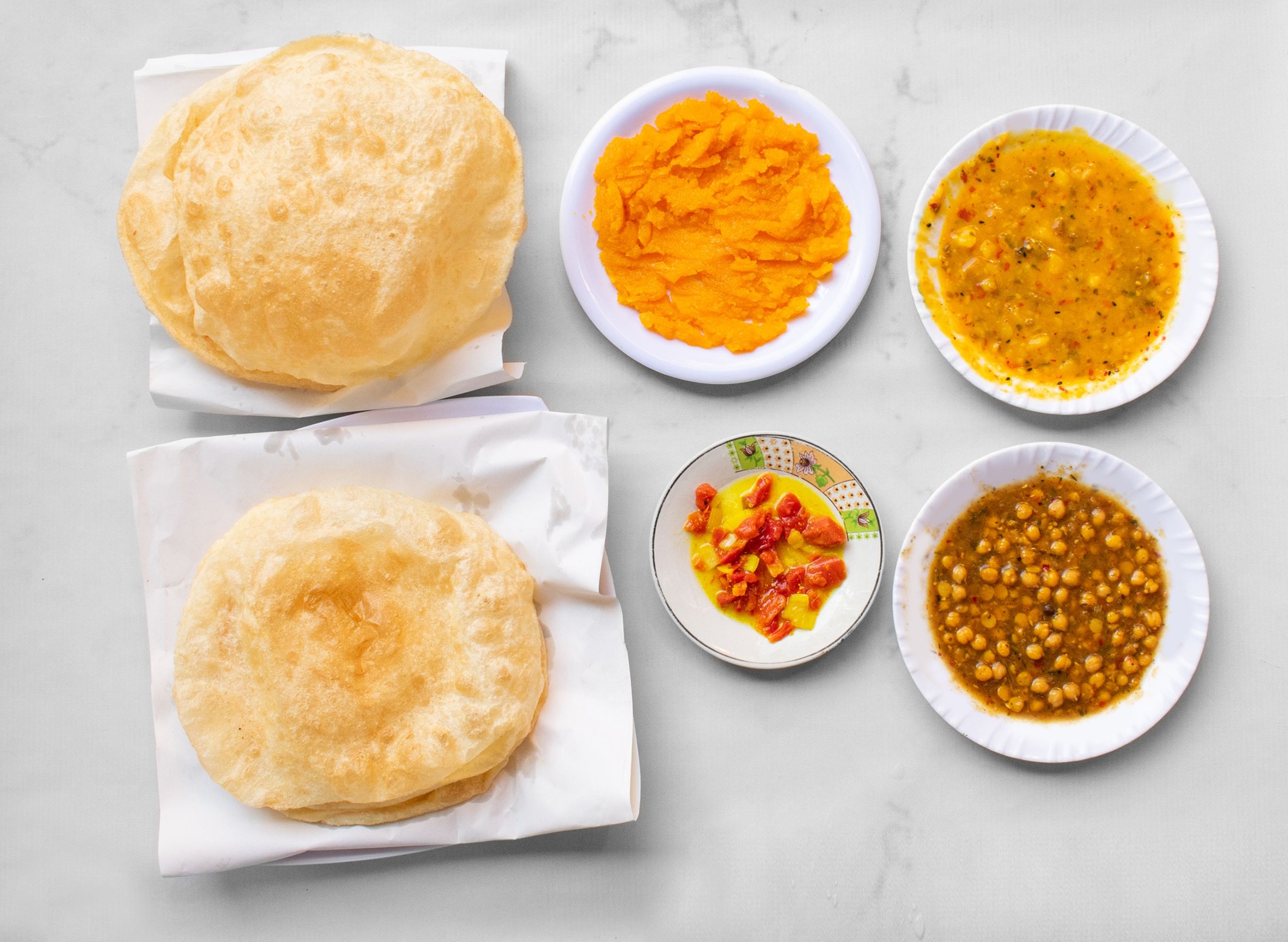 Lazeez halwa puri vendor logo