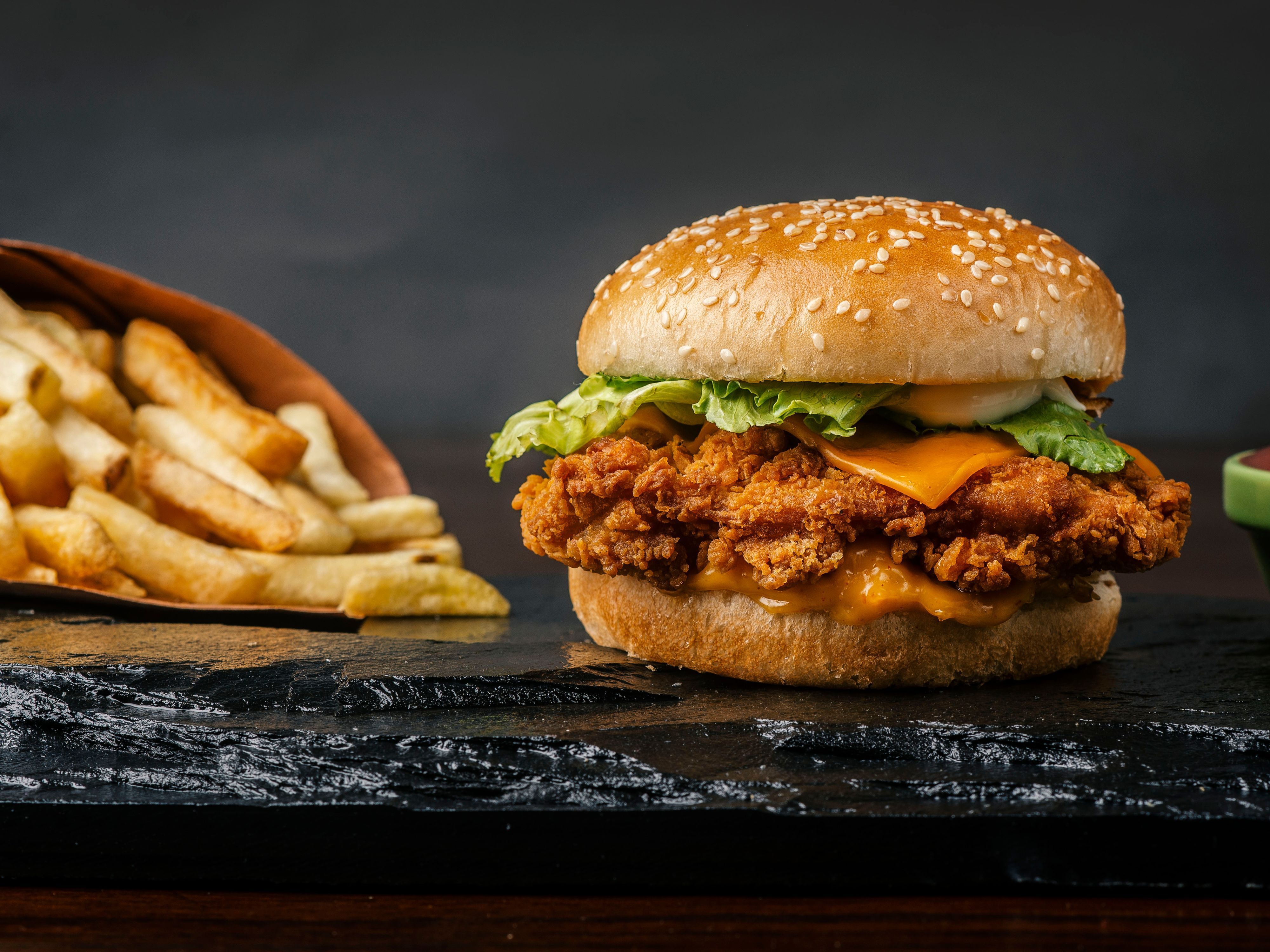 Ajun's Chicken Cajun & Burger vendor logo