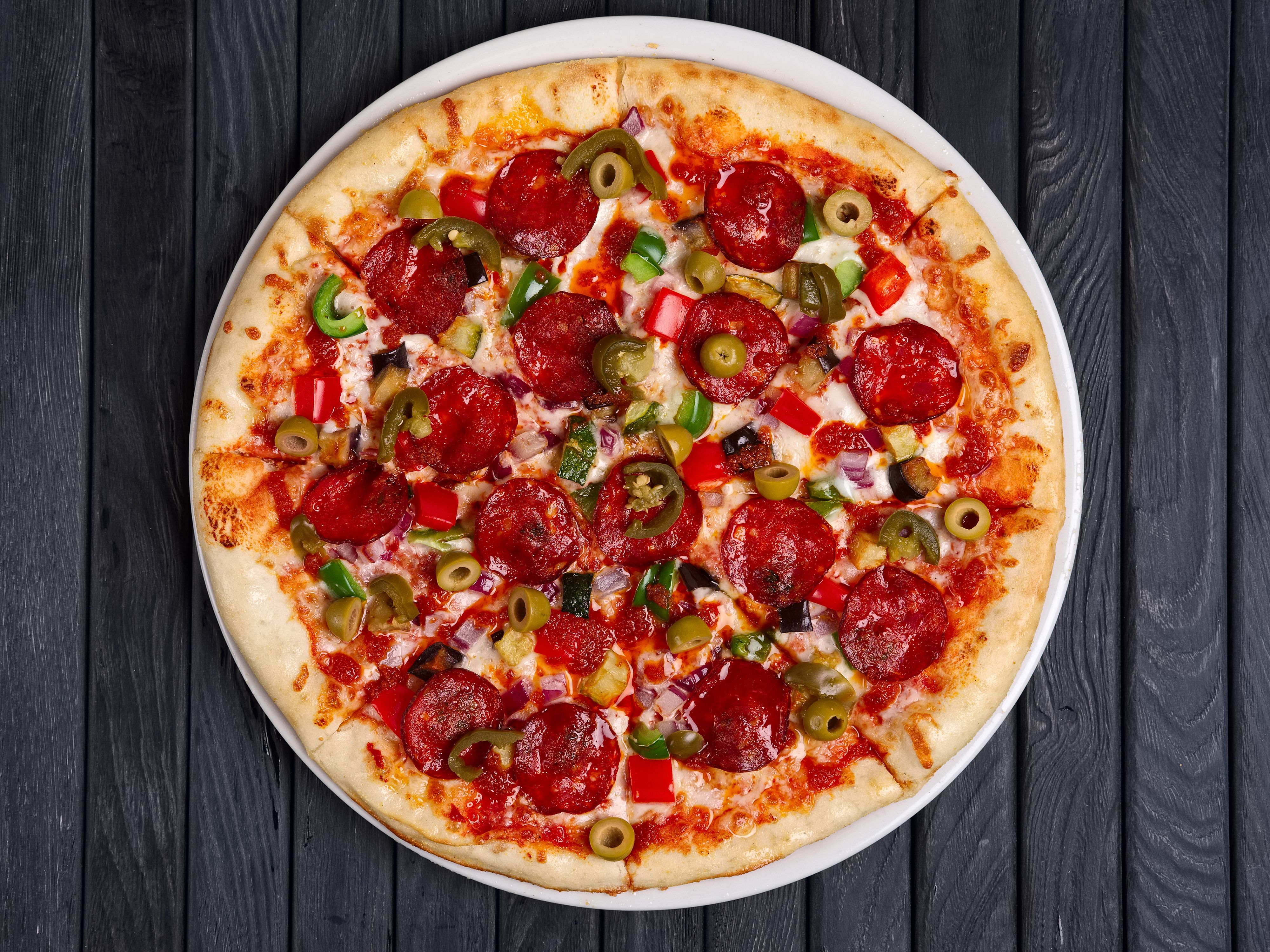 Just 4 Pizza vendor logo