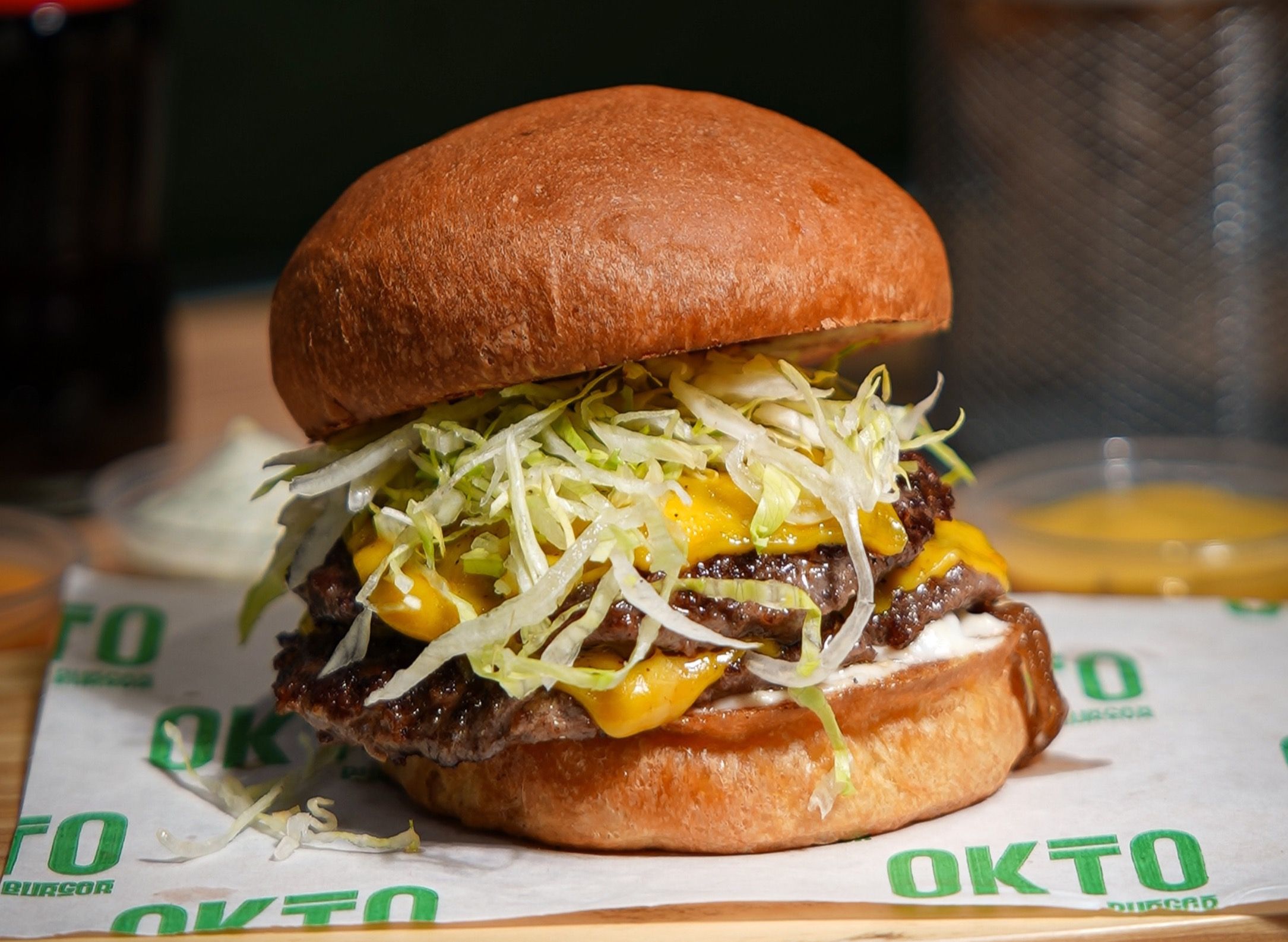 Okto Burger vendor logo