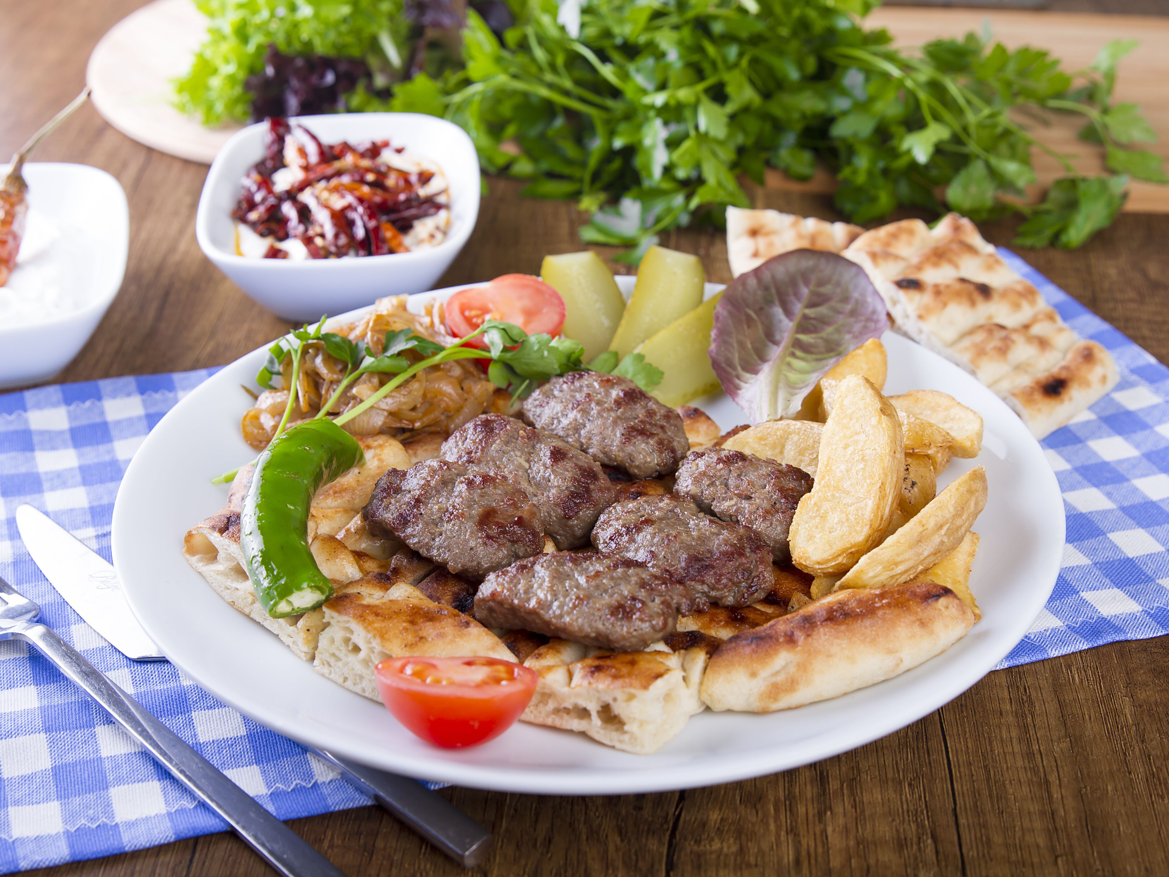 Gümrük Restoran vendor logo