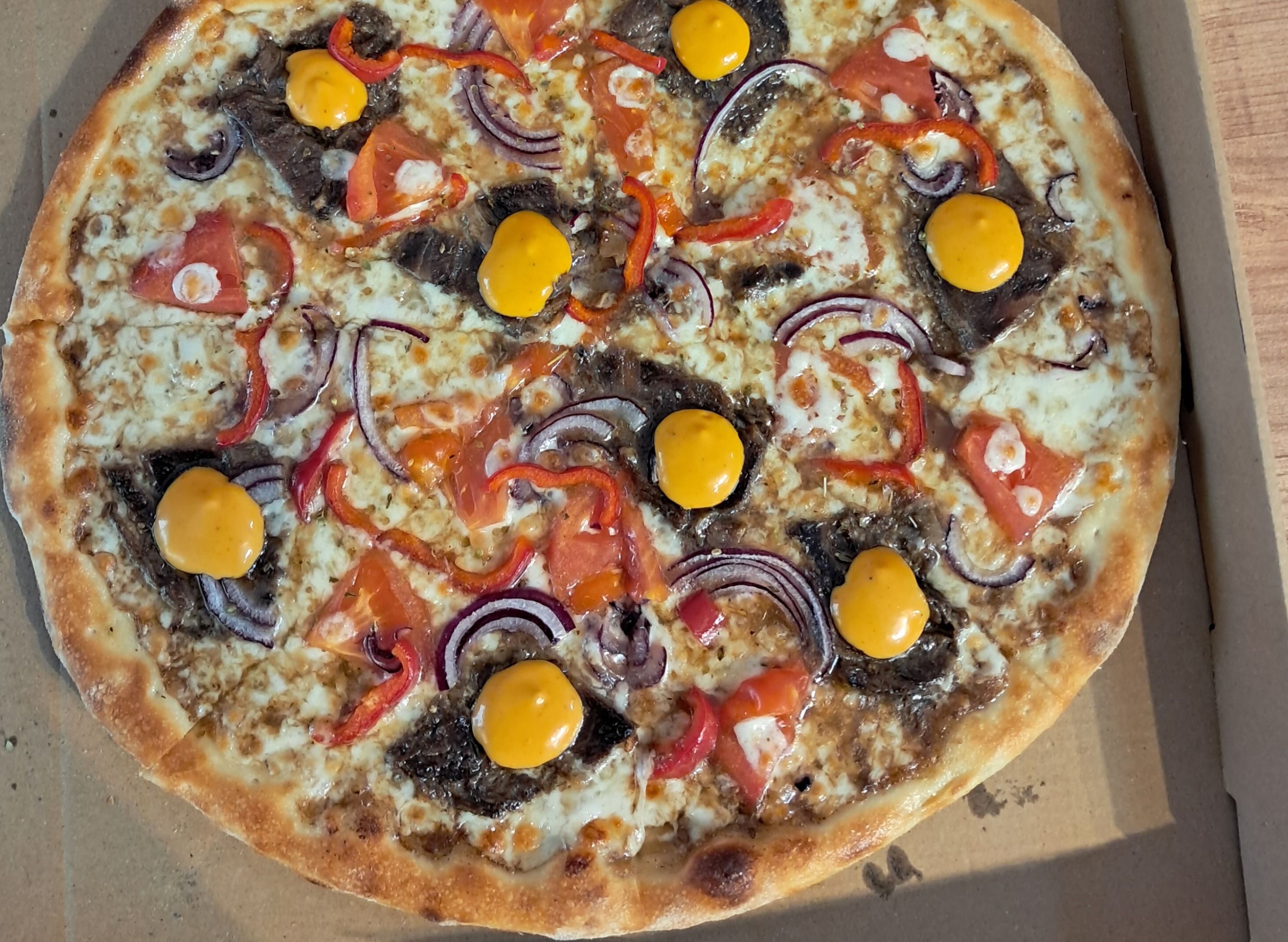 Deluxe Pizza & Burger vendor logo