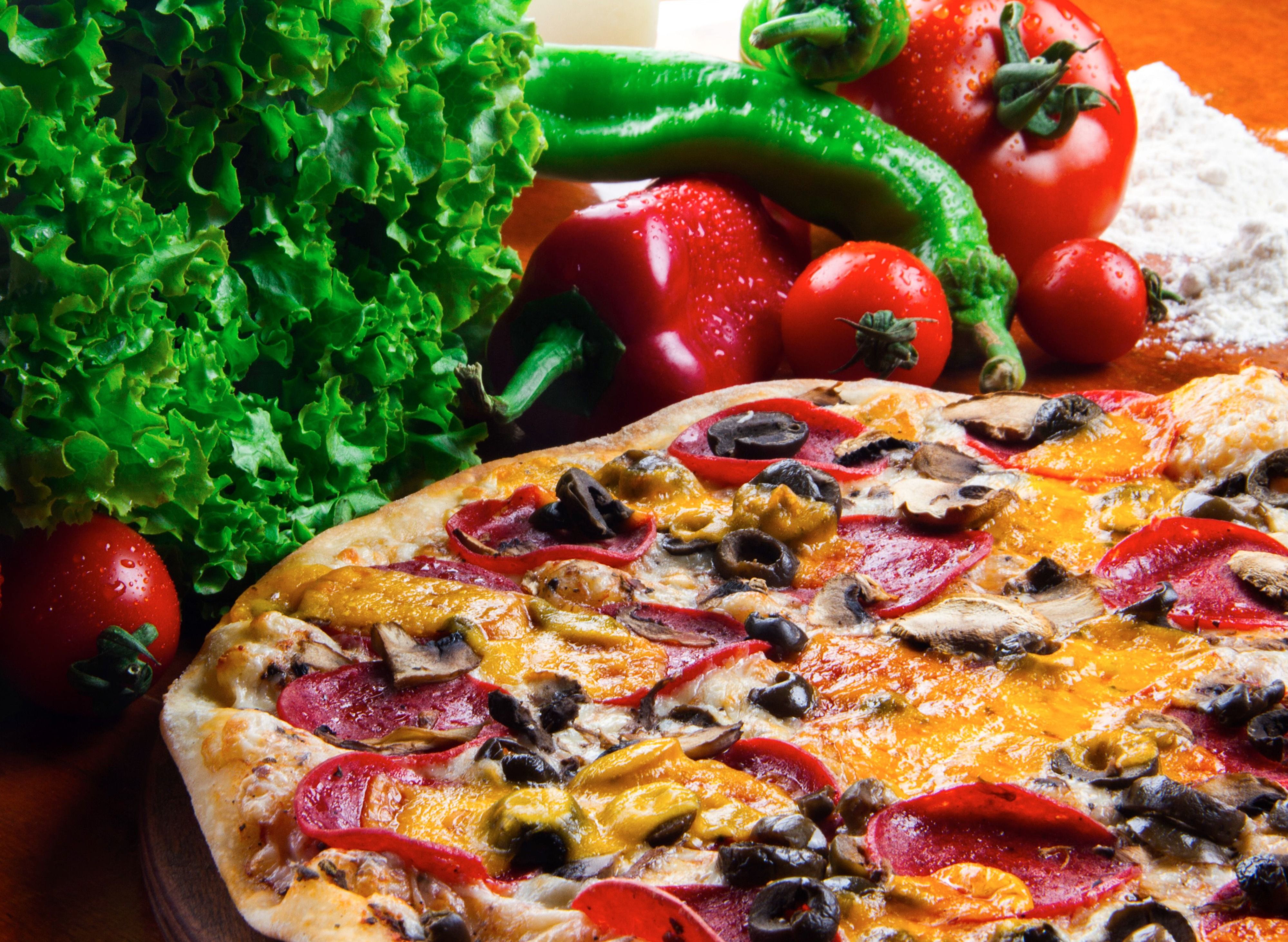 Slices of The World Pizza vendor logo