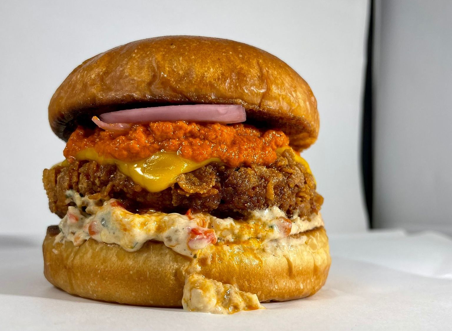 Nom Burger vendor logo