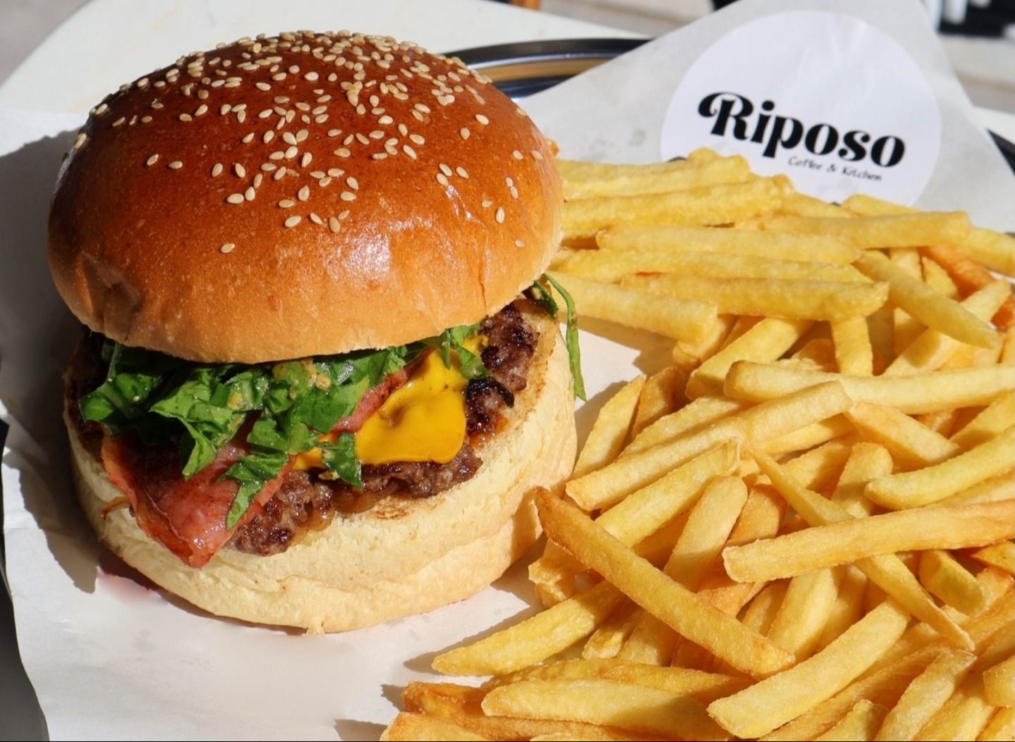 Riposo Burger vendor logo