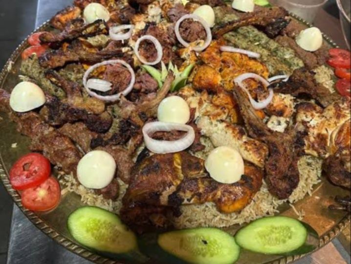 Shinwari mixed family platter with chicken, meat, seekh kebab, batair and pulao