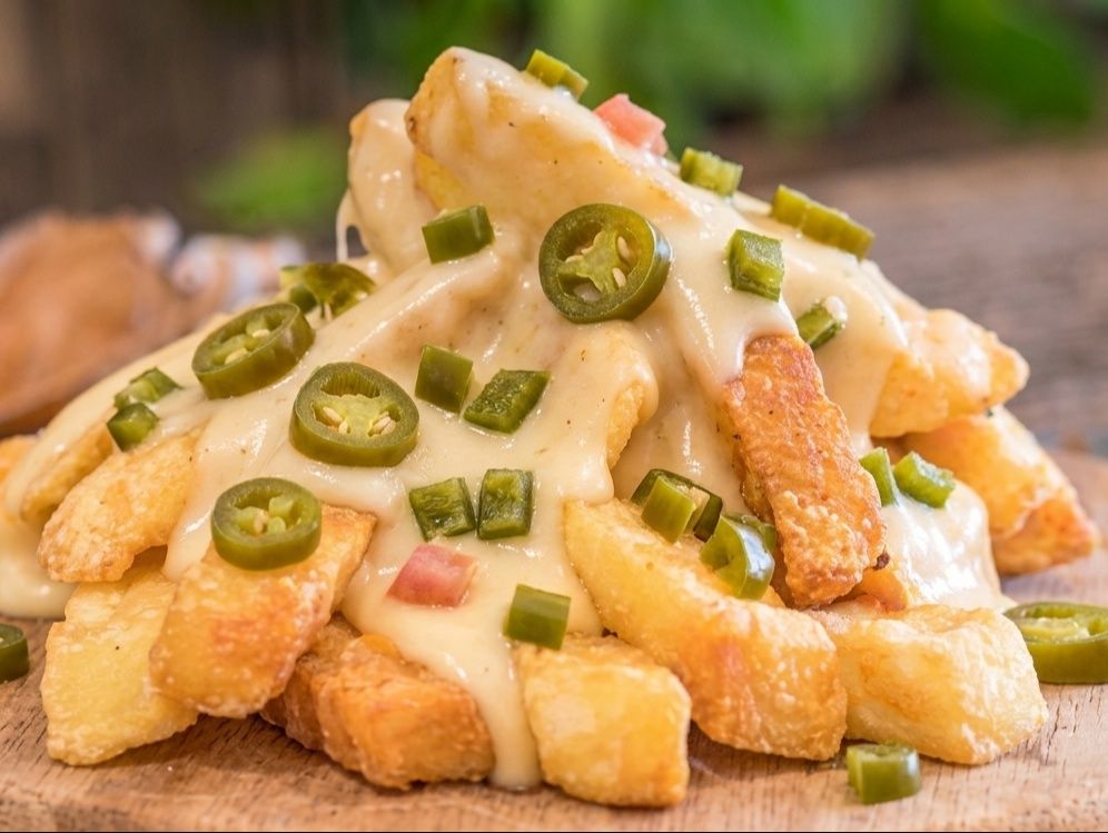 French Fries With Cheese And Jalapeños