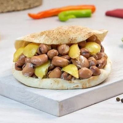 Foul With Pickled Lemons With Safflower Sauce Sandwich