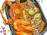 Tilapia fish, 3 pieces of shrimp, and 1 crab
