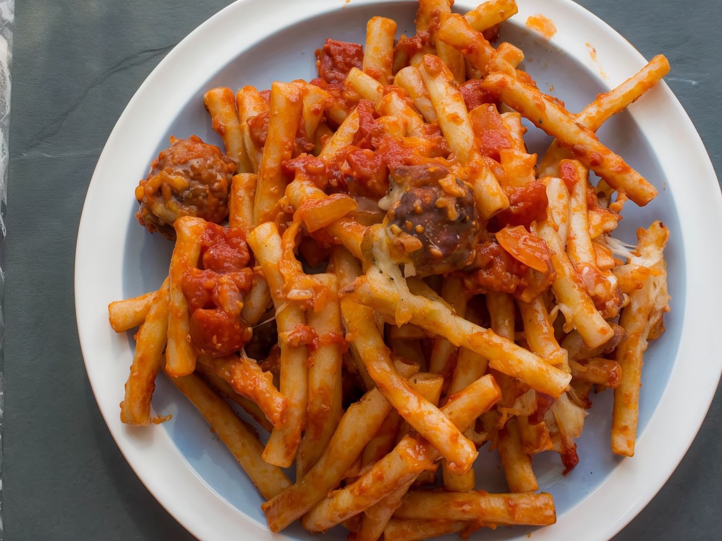 French Fries Packet With Cheese And Meat Balls
