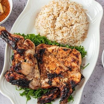 نصف دجاج على الفحم مع أرز