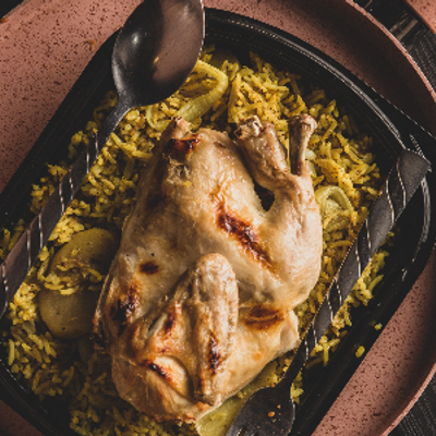 نصف دجاج مع أرز مقلوبة