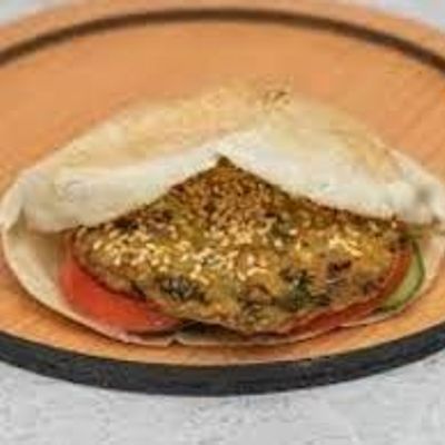 Falafel sandwich with cheese and tomato