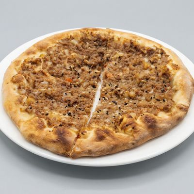 Meat Safiha with pomegranate molasses Manakish
