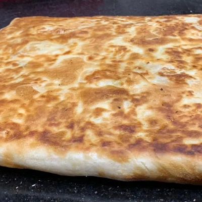 Feteer with Baladi Sausage and Kiri Cheese