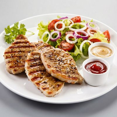 Grilled chicken breasts meal