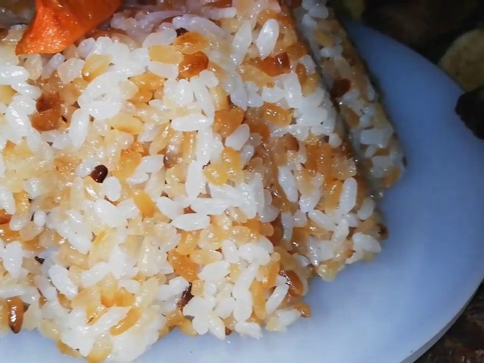 A dish of rice grain by grain