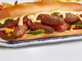 Baladi Sausage Sandwich with bell peppers, tomatoes, and oriental spices