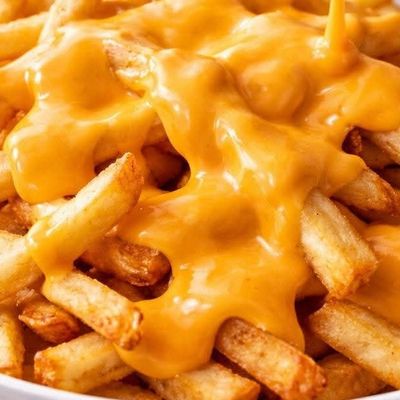 Potato dish with cheddar sauce