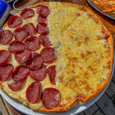 بيتزا نص سلامي ونص بسطرمة