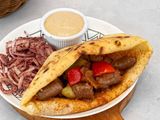 Alexandrian sausage sandwich on baladi bread.