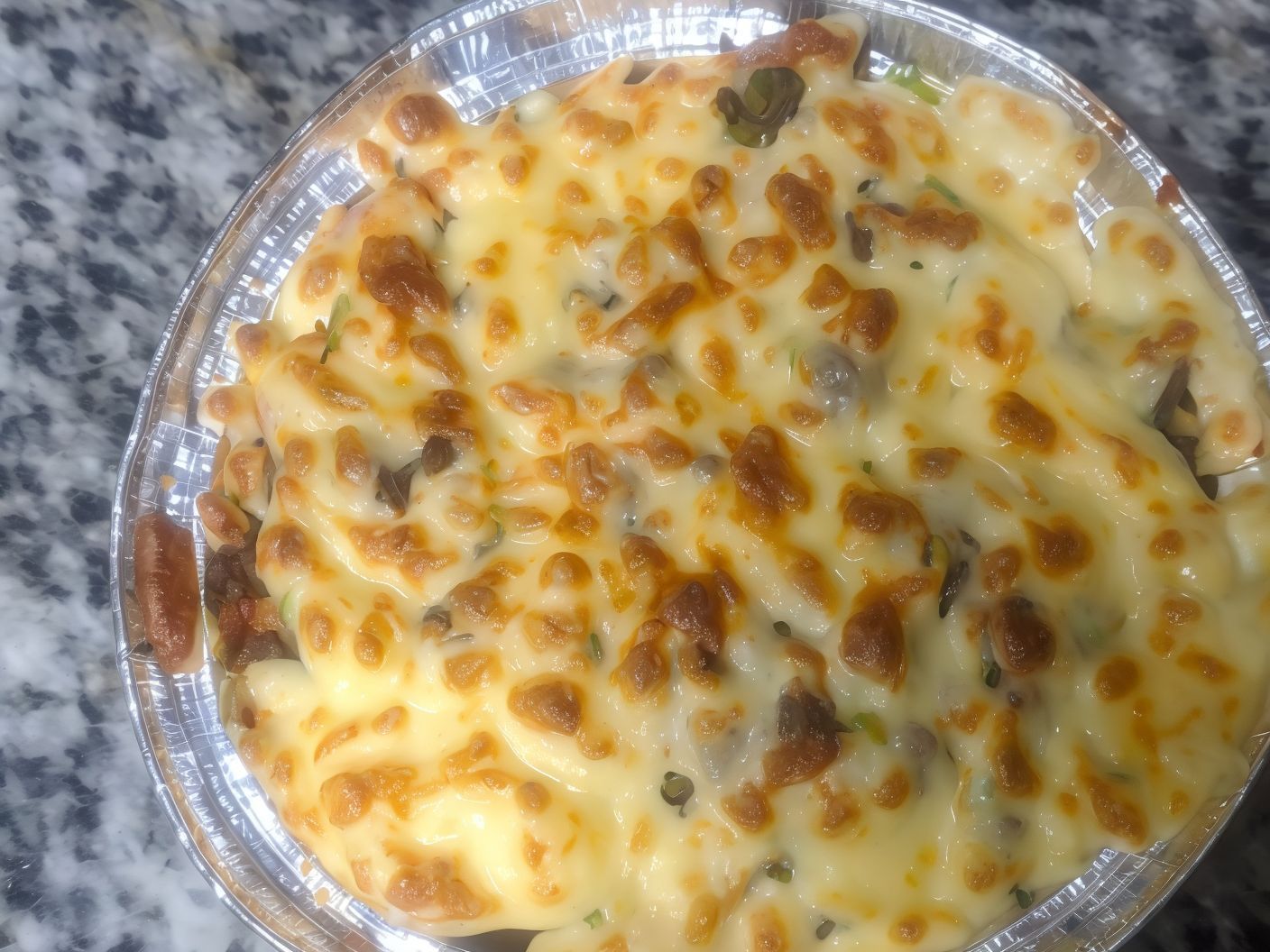 Potatoes with Cheddar Sauce
