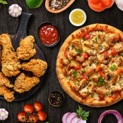 Two Fried Chicken Pieces and Small Pizza