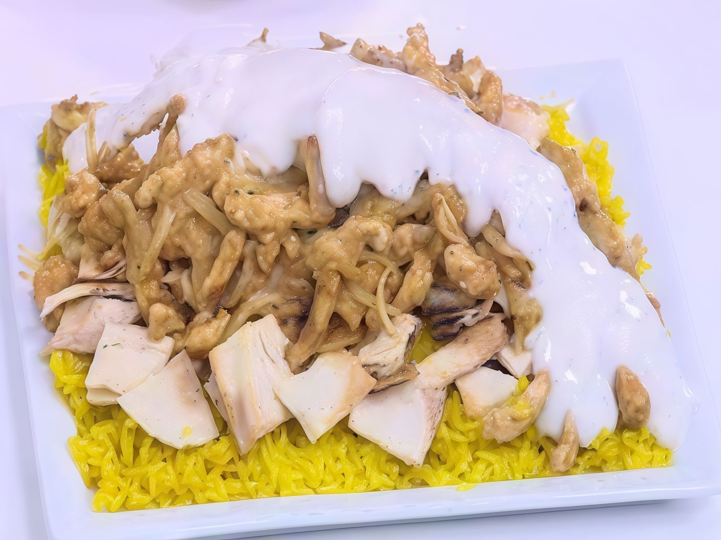 Chicken shawarma fatta with mozzarella cheese
