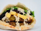 Stuffed falafel on eggplant