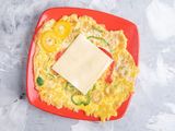 Omelette pan with cheddar cheese and olives